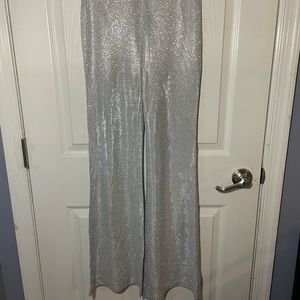 Sparkly bell bottom pants.